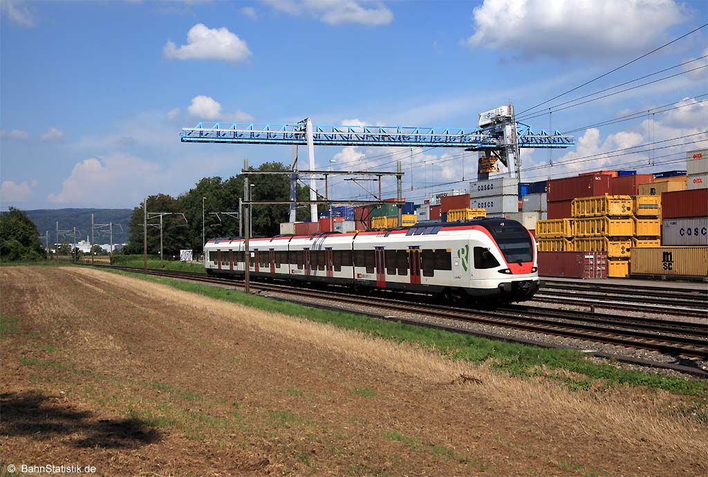 RABe 523 024-8 am 06.09.14 als S3 nach Olten am Containerterminal Frenkendorf vorbei